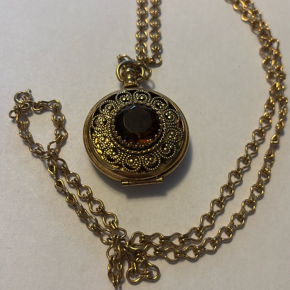 Avon pocket watch picture locket in Gold plated Vintage